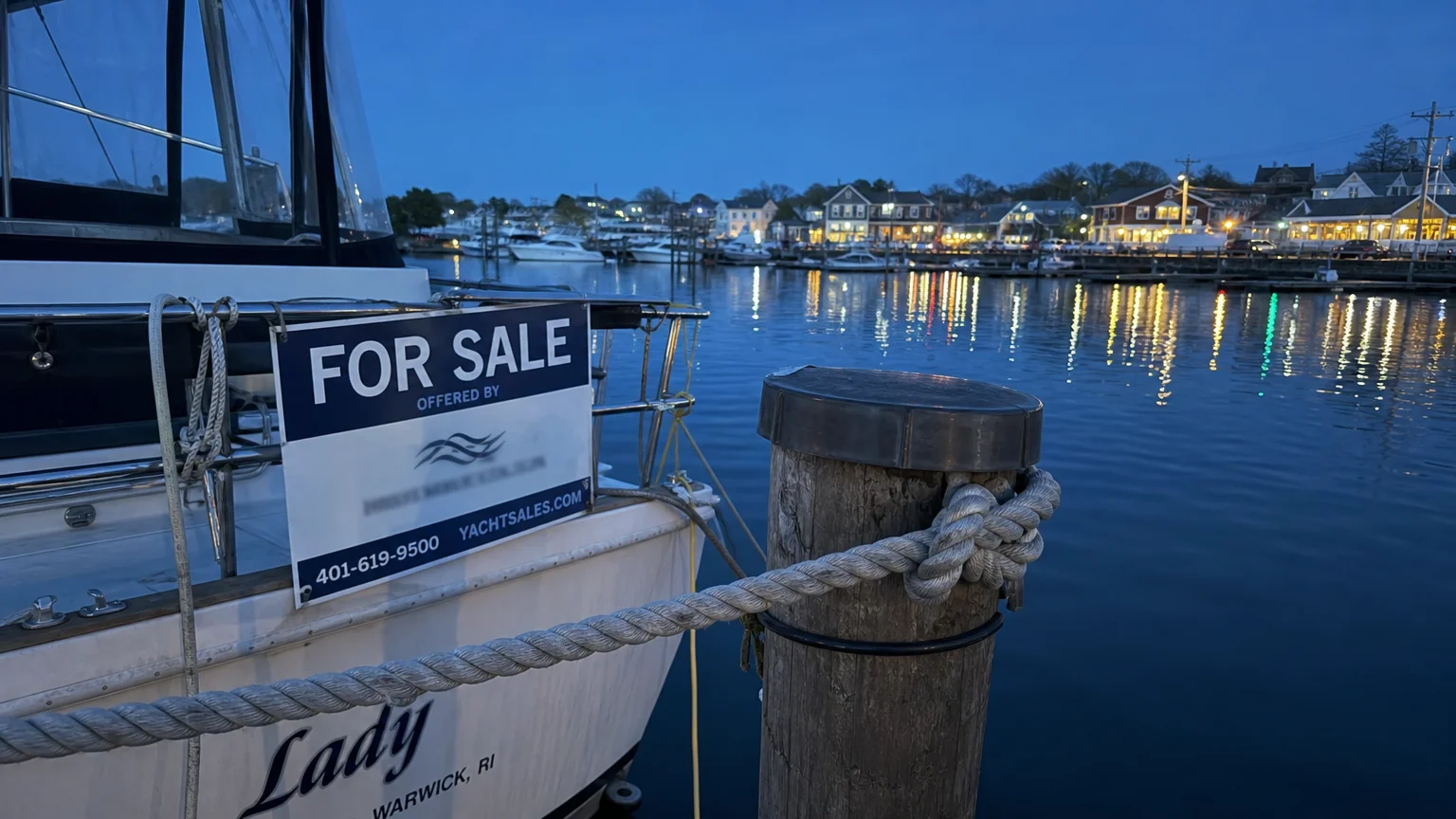 A marina in Rhode Island at dusk, representing the high-cost coastal retirement lifestyle.